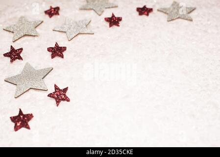 Christmas background, with red and silver glitter stars with snow - sophisticated, luxury - copy space Stock Photo