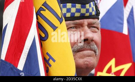 Veterans take part in a Veterans Day parade in Glasgow's George Square. Stock Photo