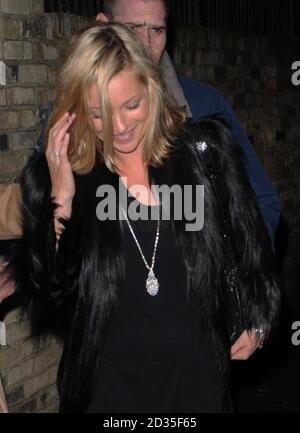 Kate Moss is spotted leaving her house in St. Johns Wood on her 35th birthday in north London.  Stock Photo