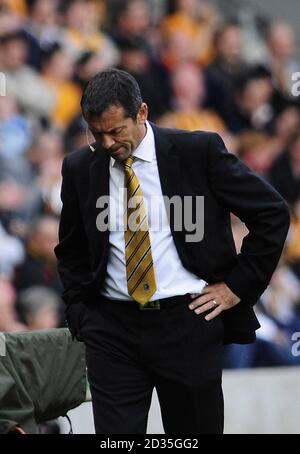 Hull City Manager Phil Brown reacts as his side go two goals down during the Barclays Premier League match at the KC Stadium, Hull. Stock Photo