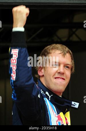 Red Bull's Sebastian Vettel of Germany celebrates taking Pole Position for the British Grand Prix during qualifying at Silverstone, Northamptonshire. Stock Photo