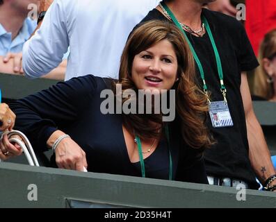 Mirka Vacrinec, watches her husband Roger Federer in action during the Wimbledon Championships at the All England Lawn Tennis and Croquet Club, Wimbledon, London. Stock Photo