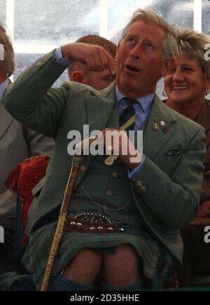 The Prince of Wales at the Mey Highland games in Caithness.  The games feature an array of events, such as tossing the caber, shot-put and hammer throwing. His annual visit keeps up the strong royal links to the area Stock Photo