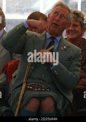 The Prince of Wales at the Mey Highland games in Caithness.  The games feature an array of events, such as tossing the caber, shot-put and hammer throwing. His annual visit keeps up the strong royal links to the area Stock Photo