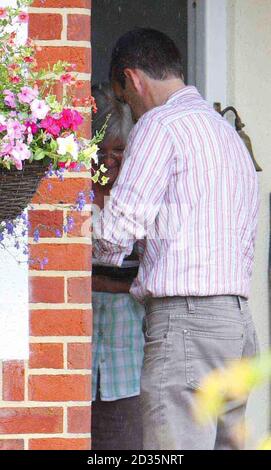 A taxi driver delivers flowers to a woman at the home of Alex Chapman, the former husband of alleged Russian spy Anna Chapman in the New Forest. Stock Photo