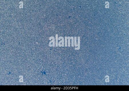 Abstract view of frost on window surface. Blue crystal frost texture. Cold winter background. Nobody Stock Photo