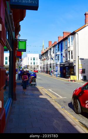 The view along Terrace Road in Aberystwyth town centre with an assortment of local shops and small business premises. Stock Photo