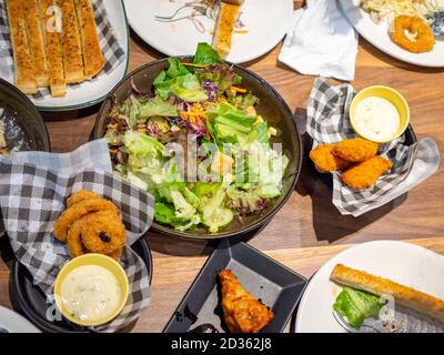Picture of a full table ready to eat For a celebration at all occasions.Food festival concept. Stock Photo
