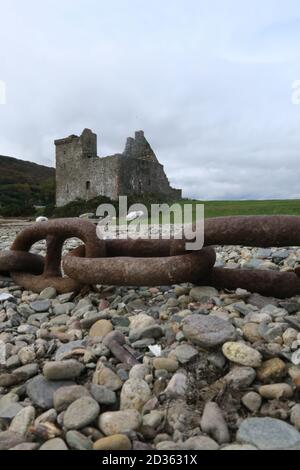 Lochranza Castle is an L-plan fortified tower house situated on a promontory in Lochranza, on the northern part of the Isle of Arran in Scotland. Stock Photo