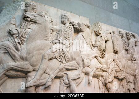Elgin Marbles horsemen from marble frieze on north side of Parthenon Athens 4th fourth century C BC British Museum London Stock Photo