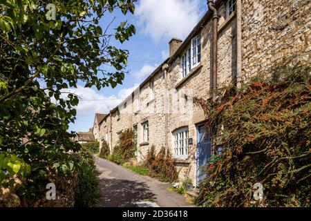 A row of stone cottages in the Cotswold village of Bisley, Gloucestershire UK Stock Photo