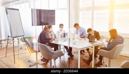 Group of business people make team meeting at business meeting in office Stock Photo