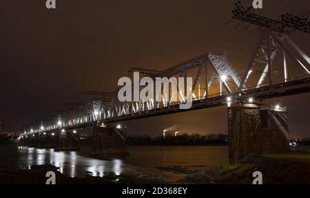 The bridge in the Night city of Novosibirsk. Stock Photo