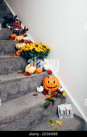 Pumpkins and decorations on stairs Stock Photo
