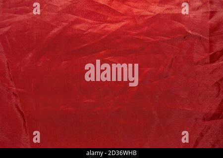 Top view of crumpled red fabric, abstract scarlet background Stock Photo