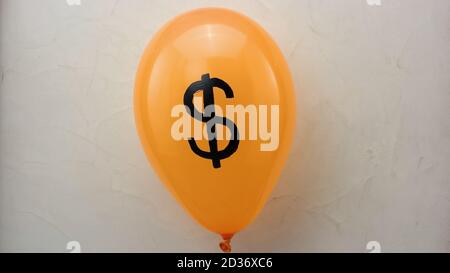 Golden balloons with dollar sign. Stock Photo
