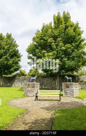 Commemorative bronze statuettes of horses in Sant Brigids park, Kill. Celebrating the success of father and son Ted and Ruby Walsh winning the Irish G Stock Photo
