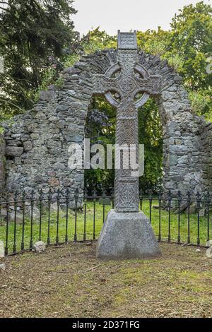 Celtic cross in the Medieval church and graveyard established by the Knights Hospitallers of St John, Johnstown, County Kildare, Ireland Stock Photo