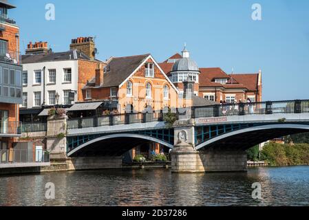 Eton, Buckinghamshire, England, UK. 2020. The Windsor and Eton bridge located between the two towns. Arched bridge made of iron and granite crossing t Stock Photo