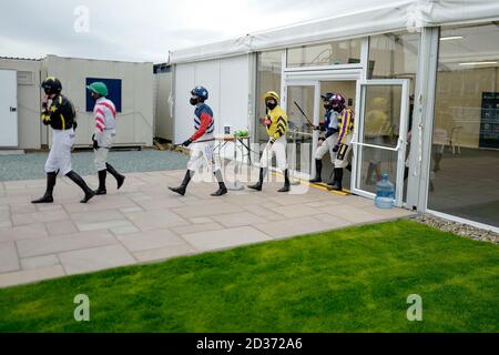 A general view as jockeys leave the weighing room at Ludlow Racecourse.