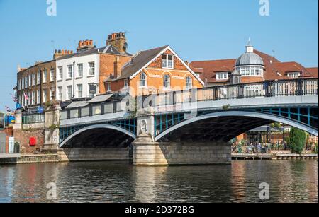 Eton, Buckinghamshire, England, UK. 2020. The Windsor and Eton bridge located between the two towns. Arched bridge made of iron and granite crossing t Stock Photo