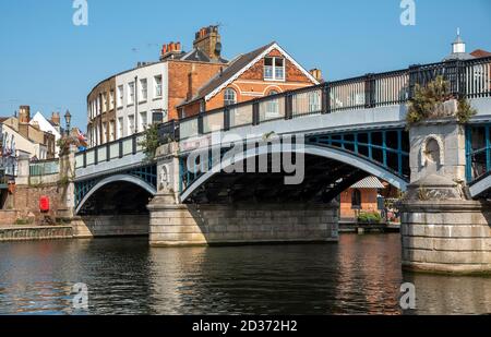 Eton, Buckinghamshire, England, UK. 2020. The Windsor and Eton bridge located between the two towns. Arched bridge made of iron and granite crossing t Stock Photo