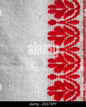 assamese gamosa ( gamusa , gamocha ) textile background ,gamusa pattern or gamosa border. gamosa is a traditional cloth of assam,north east. Stock Photo