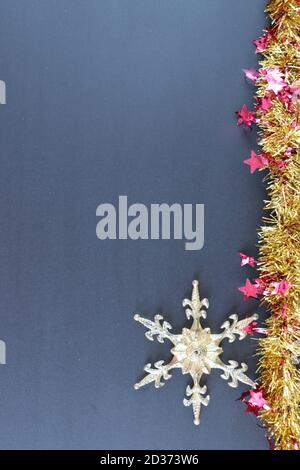Christmas background with snowflake isolated on the black background Stock Photo