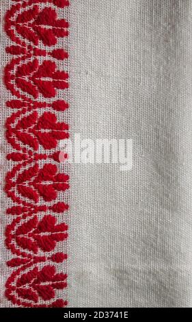 assamese gamosa ( gamusa , gamocha ) textile background ,gamusa pattern or gamosa border. gamosa is a traditional cloth of assam,north east. Stock Photo