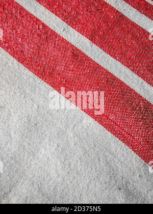 assamese gamosa ( gamusa , gamocha ) textile background ,gamusa pattern or gamosa border. gamosa is a traditional cloth of assam,north east. Stock Photo