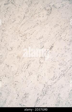 Texture of glossy white marble slab with gray spots. Stock Photo
