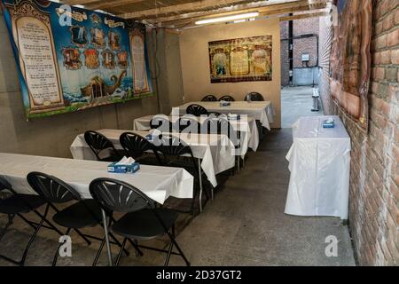 New York, United States. 07th Oct, 2020. Interior of Sukkah built for holiday ready for prayers in Borough Park in New York on October 7, 2020 during Sukkot holiday and spike in COVID-19 cases. Governor and mayor designated Borough Park and 9 other areas in the city as hot spots for spikes in COVID-19 cases. (Photo by Lev Radin/Sipa USA) Credit: Sipa USA/Alamy Live News Stock Photo