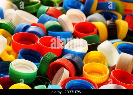 Different colored caps from bottles, great raw material for recycling. Stock Photo