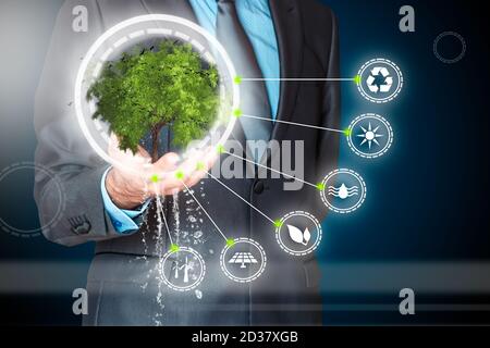 Businessman in energy efficiency concept. Stock Photo