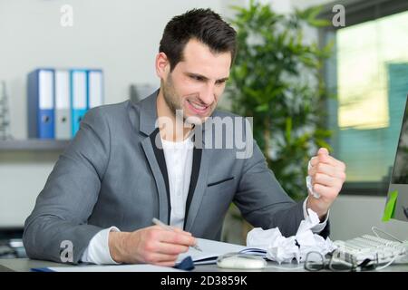 upset businessman in his office Stock Photo