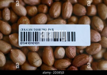 Depok, Indonesia - December 1, 2019: Barcode on the packaging of peanuts. Editorial illustrative. Stock Photo