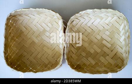 Besek (containers made of plaited bamboo) on white background. Stock Photo