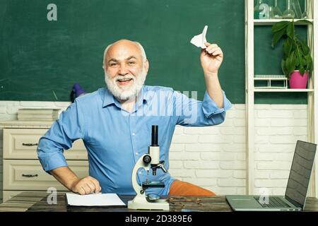 Academic success is much more about hard work than inborn talent. School concept. Old bearded mature teacher. Exam in college. Portrait of male Stock Photo