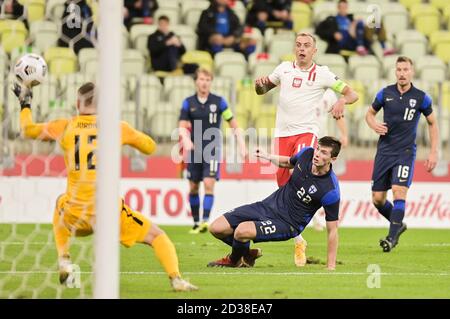 Kamil Grosicki of Poland (L) and Daniel O'Shaughnessy of Finland (R) are seen in action during a football friendly match between Poland and Finland at the Energa Stadium in Gdansk.(Final score; Poland 5:1 Finland) Stock Photo