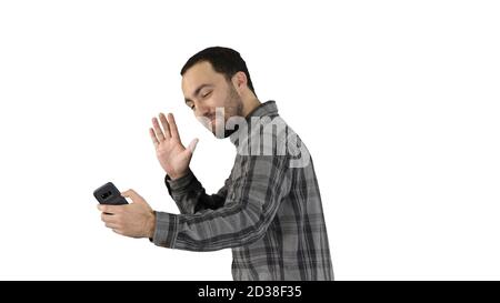 Young man taking selfie picture with smart-phone on white backgr Stock Photo