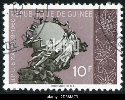 GUINEA CIRCA 1960: stamp printed by Guinea, shows Universal Postal Union Monument, circa 1960 Stock Photo
