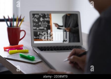 woman Video Conference Work Webinar Online Businessman Using Laptop At Desk and Watching Video Conference Stock Photo