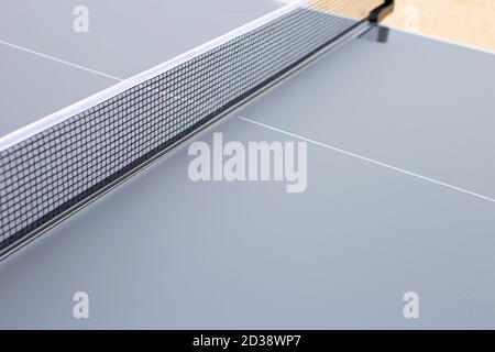 Net of table tennis ping pong on grey background Stock Photo