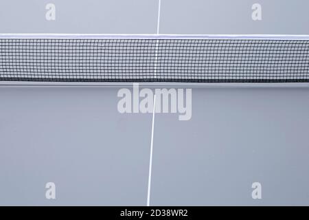 Net of table tennis ping pong on grey background. Stock Photo