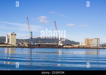 27 September 2020 A view across Belfasts dockland from HMS Caroline in the Titanic Quarter with Carrs glen and Napoleon's Nose in the background Stock Photo