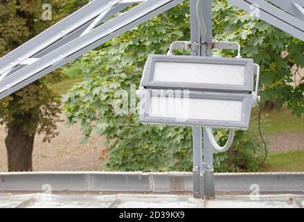 Powerfull LED lights on a roof of a building Stock Photo