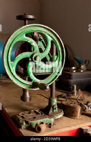 A vintage hand drill in a workshop Stock Photo