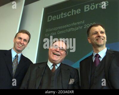 Werner G Seifert C Ceo Of Germany S Deutsche Boerse Ag Laughs As He Poses For Photographers With Members Of The Board Volker Potthoff L And Frank Gerstenschlaeger Prior To The Annual News