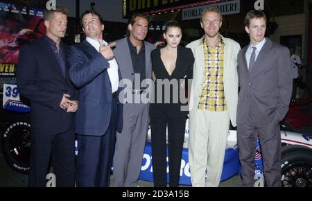 Finnish director Renny Harlin, second from right, poses with cast members at the premiere of 'Driven', his new car racing film drama April 16, 2001 at Mann's Chinese Theatre in the Hollywood section of Los Angeles. Pictured from left are Til Schweiger, Sylvester Stallone, Christian de la Fuente, Estella Warren, Harlin and Kip Pardue.  JR