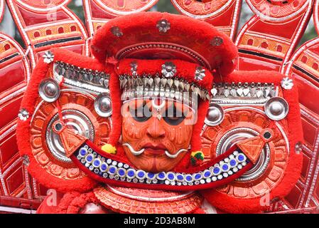 THRIPPUNITHURA, INDIA Onam Men dressed as theyyam Theyam, Theyyattam festival of Onam. Body painted artists perform Tiger dance Indian folk art Stock Photo